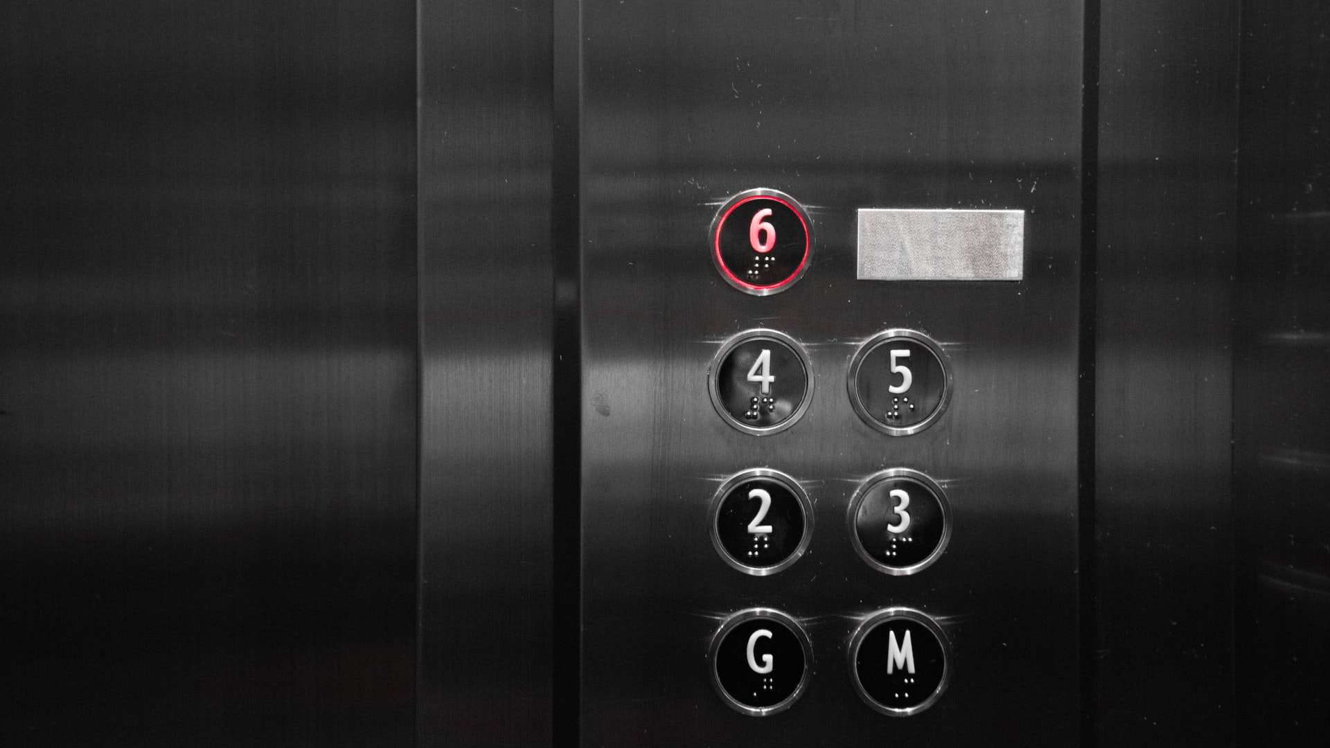 elevator buttons in an elevator