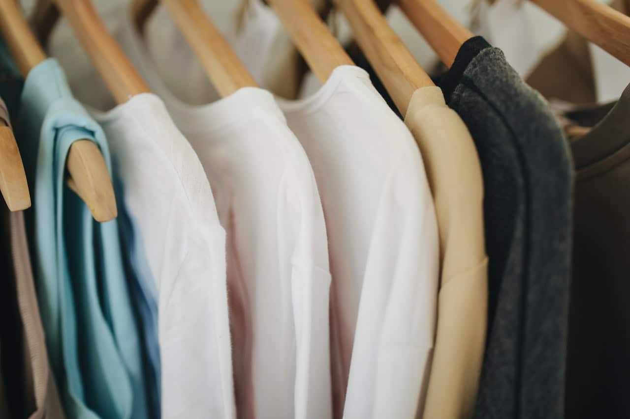long sleeve shirt on clothing hangers