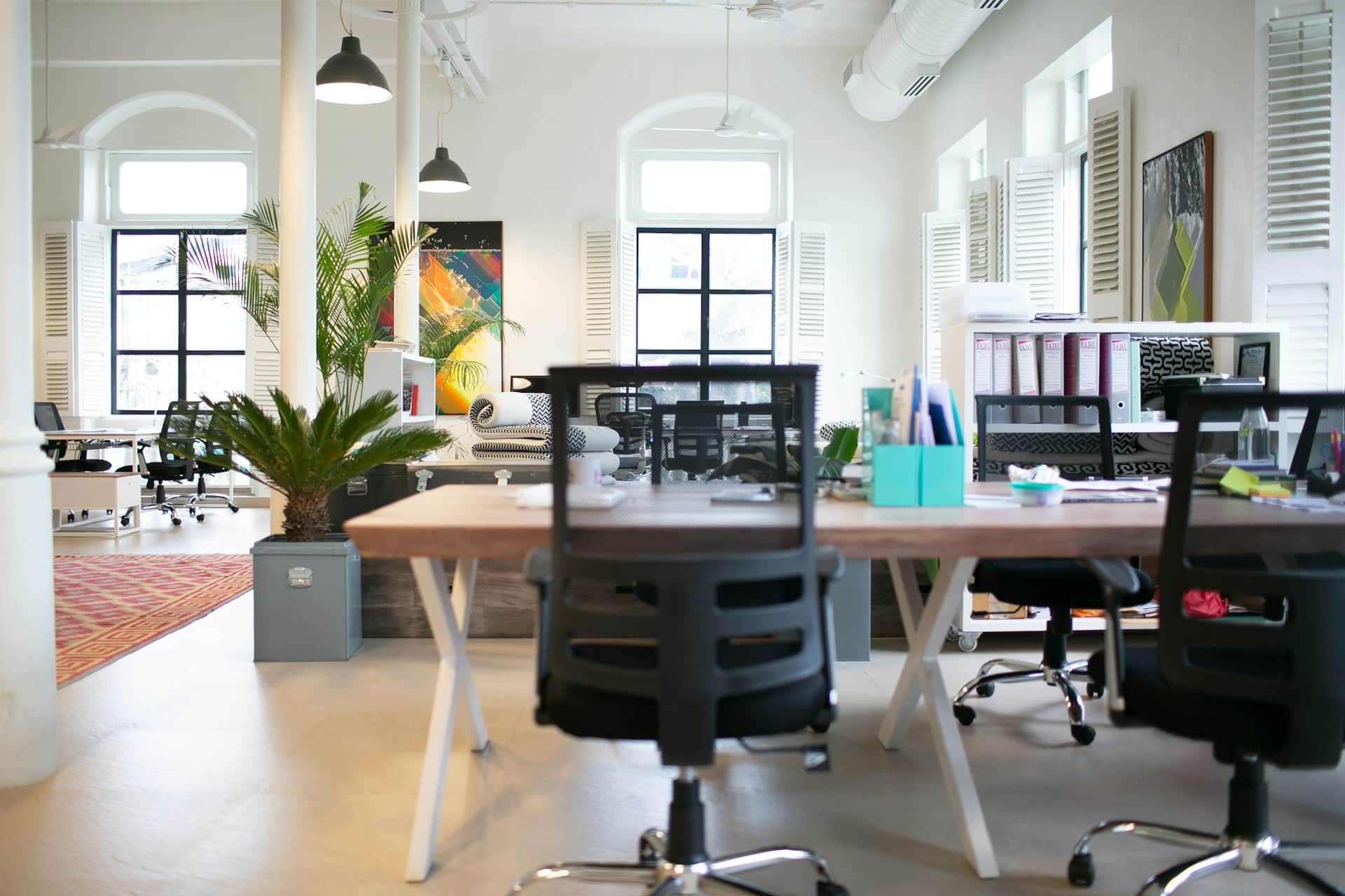 empty desk chairs in office